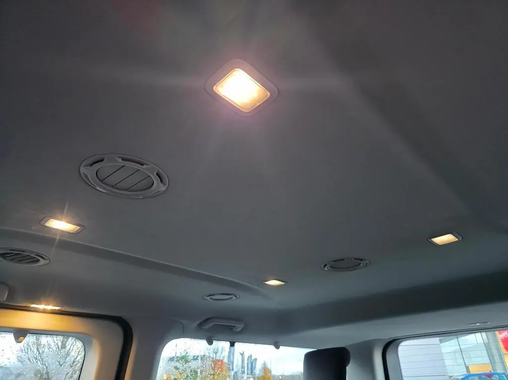 MPV interior with ceiling lights and air vents